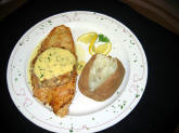 Fish "Lorenzo" with our crabcake on top and bï¿½arnaise sauce.
